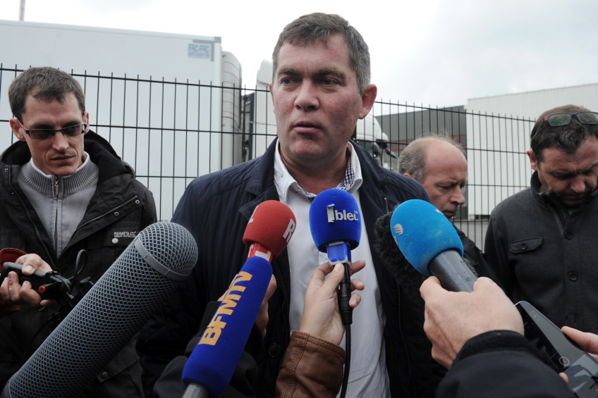 President of the French National Federation of pigs Paul Auffray Pig  farmers talks to the press after a meeting with French meat-processing  plant Bigard's management on September 21, 2015 in Quimperle, western  France.