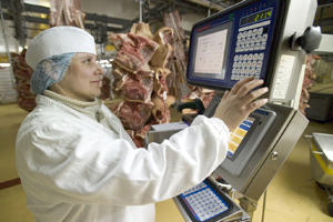 Quality control in a Smithfield slaughterhouse in Poland. It is these best practices that will find a way into China through the acquisition.