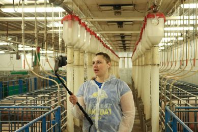 Graduate research assistant Katelyn Zeamer in action during one of the virtual barn tours at the SDSU Swine Education and Research Unit. - Photos: SDSU