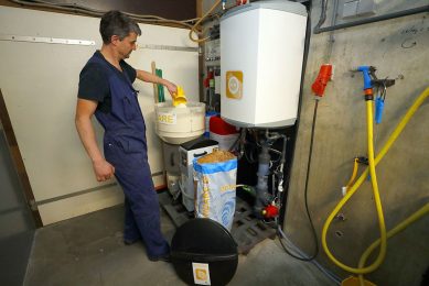 Wilfred Bankers refilling the dispenser   it s the only thing he needs to do with dispensing milk. Photo: Bert Jansen