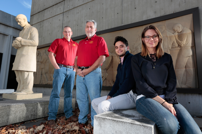 ISU veterinary researchers (from left) Drew Magstadt, Kent Schwartz, Paulo Arruda and Bailey Arruda worked to pinpoint a pestivirus that causes congenital tremors in young pigs. [Photo Christopher Gannon]