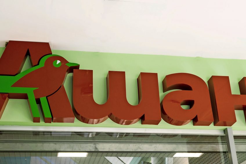 A Russian sign with the supermarket name  Auchan . Photo: Dreamstime