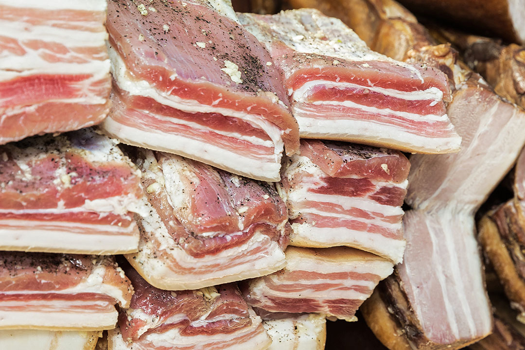 Large chunks of bacon, which after rendering can yield a lot of lard. - Photo: Canva
