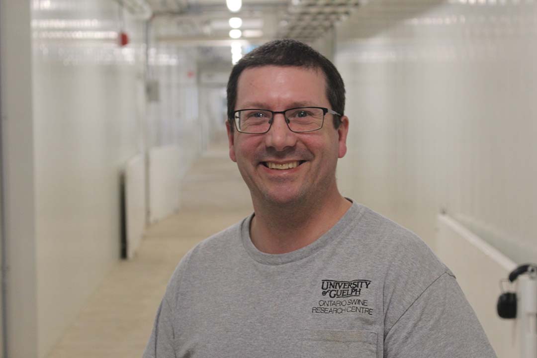 Troy McElwain ((44) is technical foreperson at the ntario Swine Research Centre, located near Elora, ON, Canada. This is a brand new research farm managed by the University of Guelph, and was opened in August 2023. It is a farrow-to-partially-finish farm with a capacity for 300 to 350 PIC sows. The facility cost around CAN$ 20 million to build (US$ 14.7 million), and replaced an older unit close to Guelph dating from 1979. The research centre is located in the vicinity of the  research centres for dairy, beef and feed production. A novel facility for poultry production is being planned.